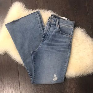 High waisted light wash flares. Note: short inseam